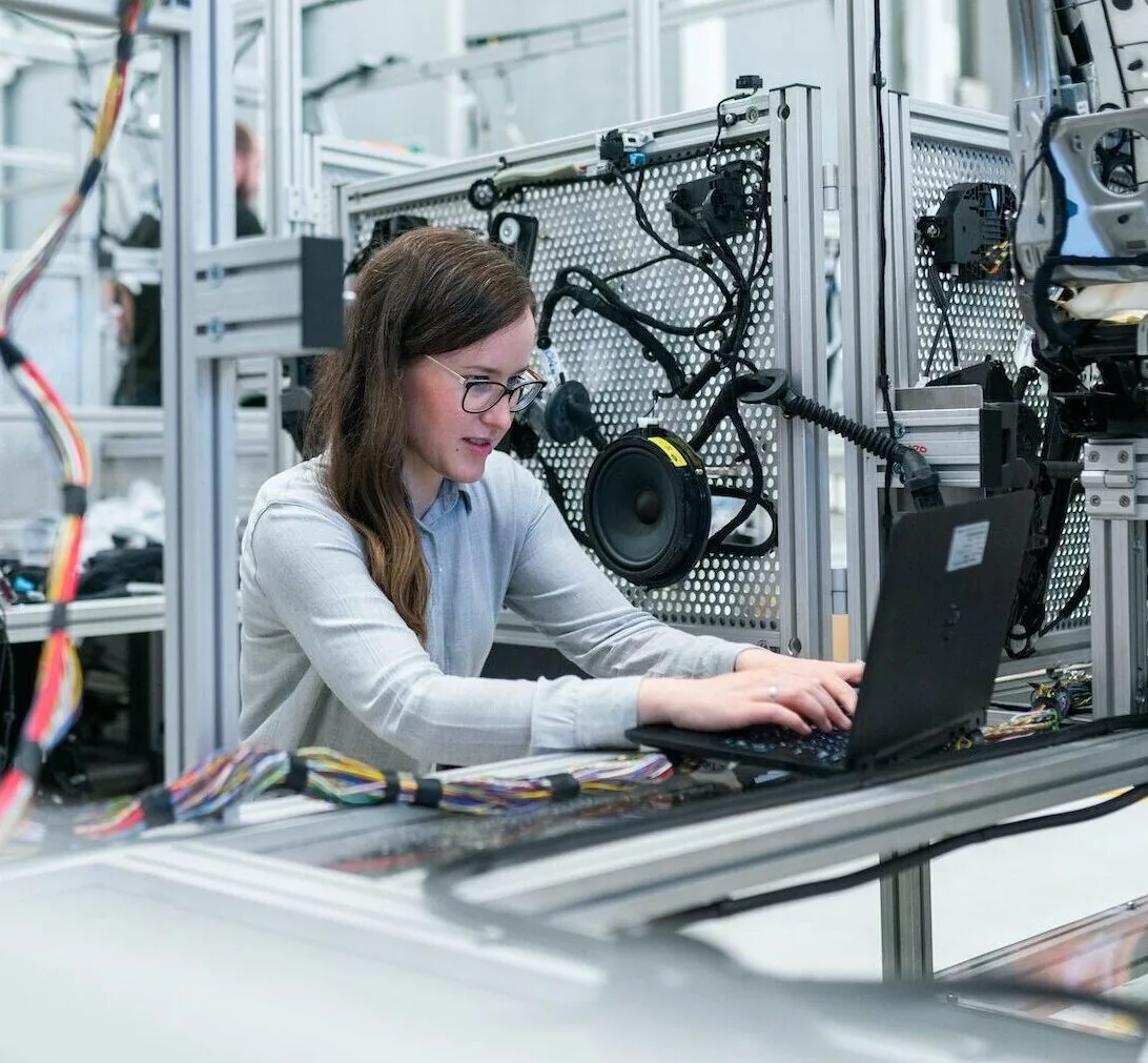A woman working on manufacturing automation processes